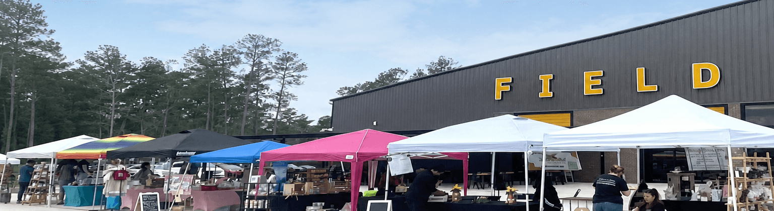 Vendor tents at Community Fieldhouse